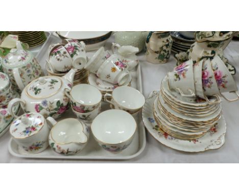 A Royal Crown Derby "Derby Posies" part tea service, 36 pieces approx; a Wedgwood "Charnwood” tea service, 21 pieces approx