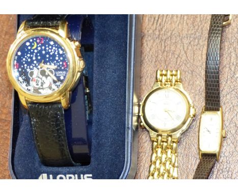 A Lorus Mickey & Minnie Mouse musical wristwatch, cased; a Pulsar ladies wristwatch; and another; a Timex Indiglo