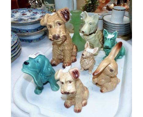 A collection of Sylvac dogs; an Art Deco glass candlestick