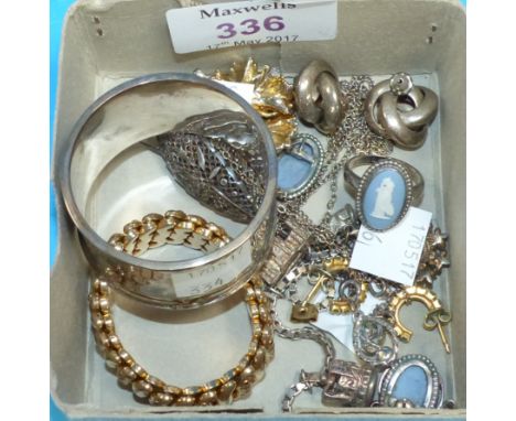 A white metal charm bracelet with 4 charms; a hallmarked silver ring set with blue Jasperware cameo and matching earrings; a 