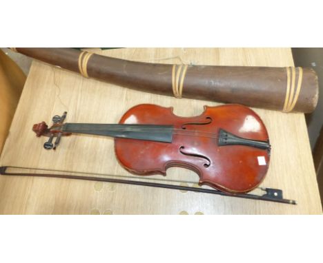 A 19th century violin and bow in case; a tribal horn