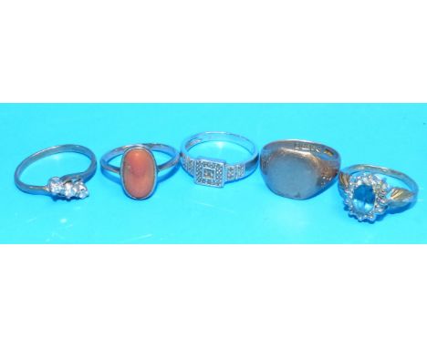 A 9 carat white gold ring set small diamonds; another set coral; a dress ring set blue stone; 2 further 9 carat gold rings