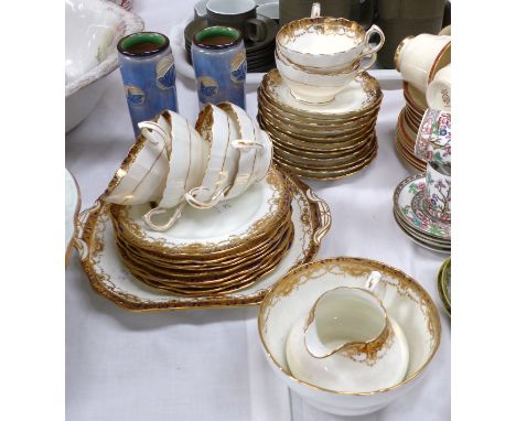 A pair of Royal Doulton vases decorated with bluebirds, the base with monogram 'CA', height 6"; a Hammersley gilt decorated p
