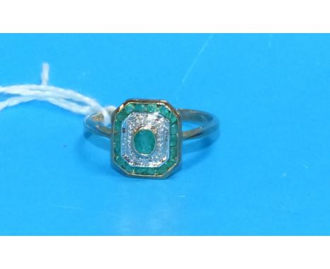 An Art Deco 9 carat hallmarked gold dress ring set with emerald and diamond simulant, 75 gm