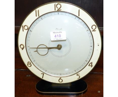 A 1950's Kienzle electric mantel clock with circular dial