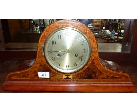 A 1920's 2 train mantel clock with burr walnut inlay to the case