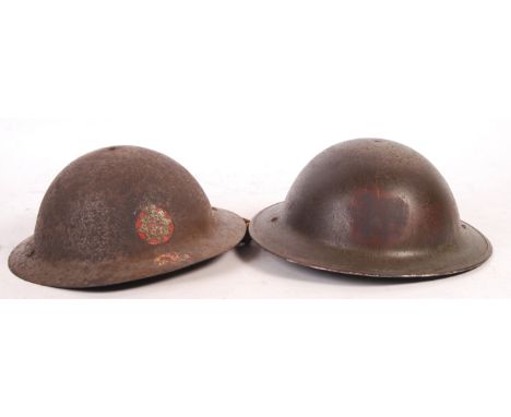 A vintage post-WWII Second World War NFS National Fire Service steel Brodie helmet, complete with liner and chin strap. Along