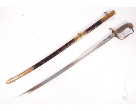 A 19th Century Victorian British Army Scots Guards officer's sword having a ray skin and wire bound grip, brass hilt with lio