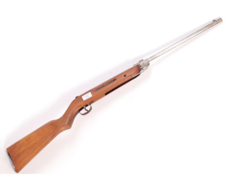 An original vintage Diana Model 25 break barrel air rifle. .22 calibre Wooden stock, with adjustable BSA sight to barrel. Ful