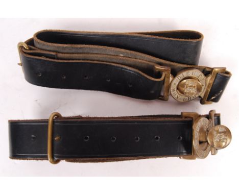 Two original vintage WWII (or post-WWII) Second World War British Army Service Corps uniform belts. Black leather, both with 