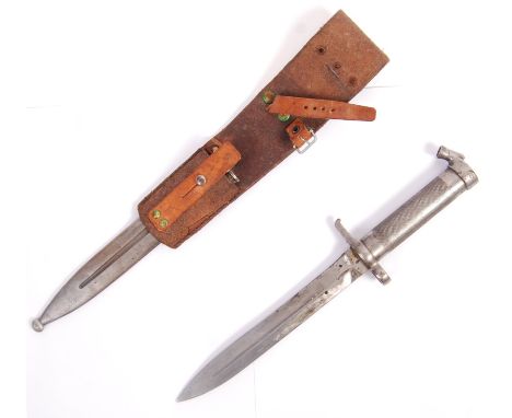 An original WWI First World War M1896 pattern Swedish Mauser bayonet having a chequered steel grip, socket hilt, crossguard w