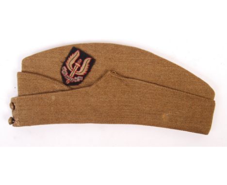 A rare original WWII Second World War SAS ( Special Air Service ) badged infantry forage / side cap. Dated 1940 to inside, wi