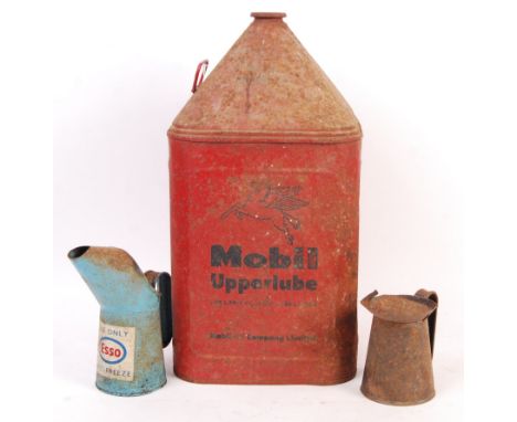A collection of original vintage 20th century oil / petrol automobilia classic car cans comprising a large Mobil Upperlube, U