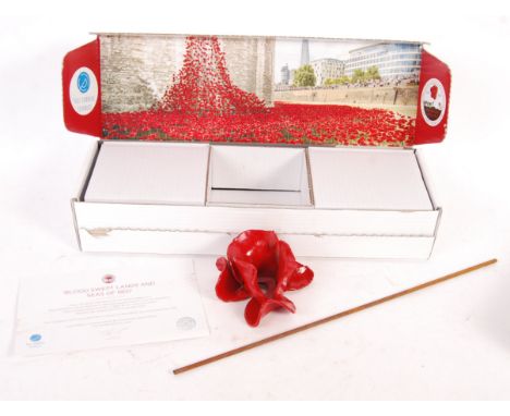 Paul Cummins and Tom Piper - An original ceramic poppy from the art installation 'Blood Swept Lands And Seas Of Red' shown at
