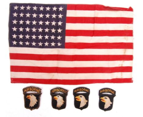 A good collection of original WWII Second World War US Army 101st Airborne related items, comprising of x4 original ' Screami