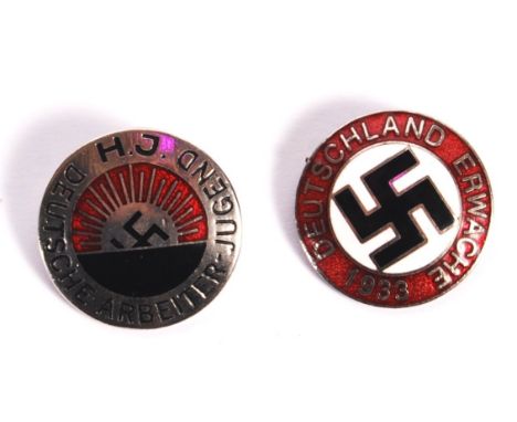 Two replica WWII Second World War period German Third Reich Nazi Party enamel and metal pin badges comprising a 1933 Deutschl
