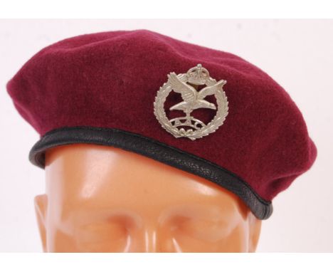 An original WWII Second World War AAC ( Army Air Corps ) Glider Pilot's maroon ariborne uniform beret with original cap badge