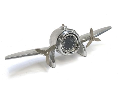 An aluminium novelty prop plane vintage desk clock, 35cm wide