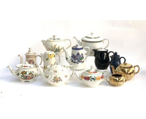 A quantity of teapots and coffee pots to include Japonica; Masons; Copeland Spode; Royal Worcester St. Andrews; Gibsons; Denb