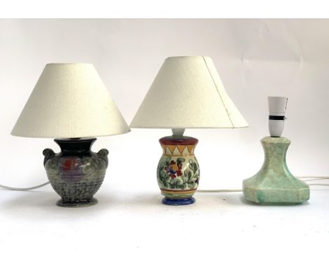 A small Langham pottery table lamp, 31cmH to top of shade; together with two other small ceramic table lamps