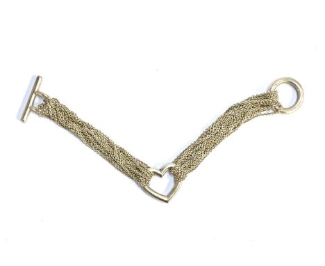 A Tiffany &amp; Co. silver multi strand heart bracelet, 18.5cmL, the clasp bar marked 'Tiffany &amp; Co 925', 33.8g