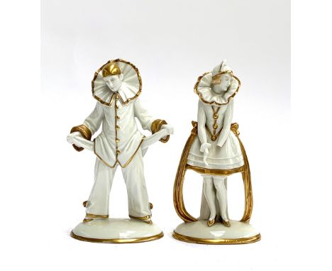 A pair of Sitzendorf Art Deco porcelain Pierrot clown figurines (af), the male signed Siegel to reverse, heightened in gold, 