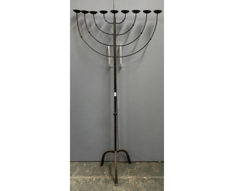 A wrought iron floor standing menorah candlestick, 165cmH