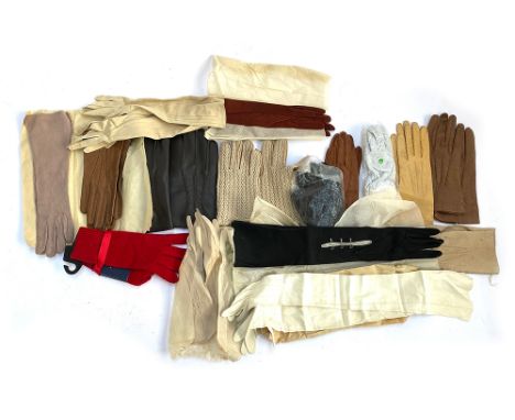 A quantity of vintage ladies and gents gloves to include leather, suede, evening, some unworn