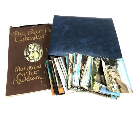 POSTCARDS. A postcard album with some loose cards. Some vintage. And an Arthur Rackham 1977 'Peter Pan' Calendar.