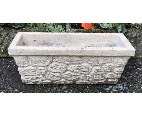 A composite stone trough planter, 66x27x25cmH