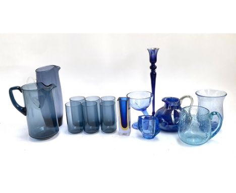 A quantity of blue glass to include water jug and glasses; candlestick holder etc