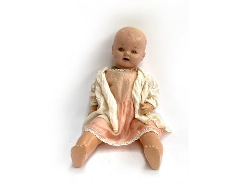 A vintage 'Petite' doll, 60cmL