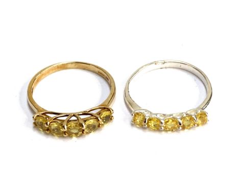 A 9ct gold ring set with five yellow sapphires, size S, 2.3g; together with a 925 silver ring set with yellow sapphires, size