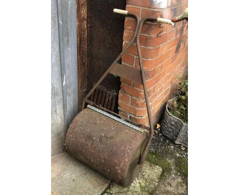 A vintage garden roller