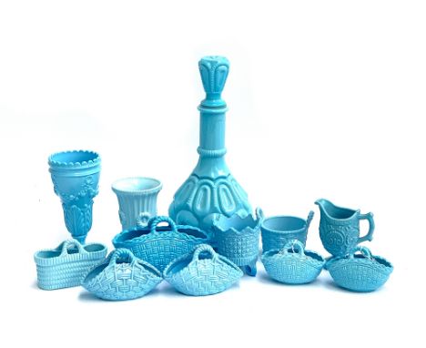 A collection of blue milk glass to include pairs of Victorian Sowerby baskets; pressed glass vases and a vintage decanter, 31