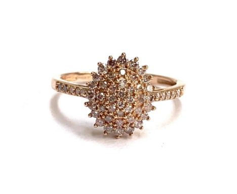 A 9ct rose gold diamond cluster ring, size P, 2.3g
