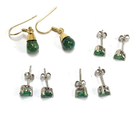Three pairs of silver and Zambian emerald stud earrings, each pair totalling 0.7cts of emeralds; together with a pair of silv