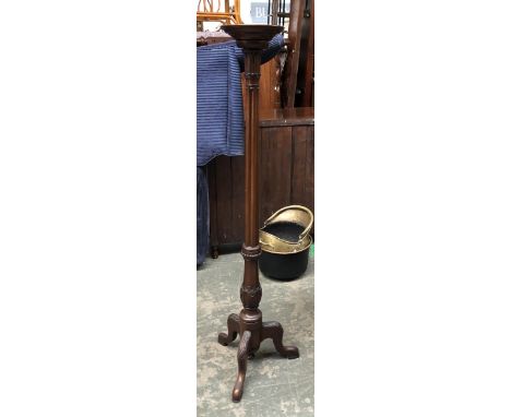 A 19th century mahogany torchere/pot stand on carved tripod base, 145cmH