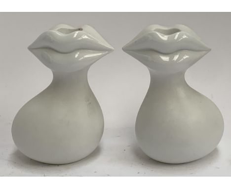 A pair of rare Goebel Salvador Dali Foundation porcelain candlesticks in the form of abstract lips, 13cm high