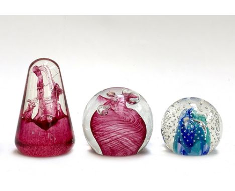 Three Caithness glass paperweights, 'Nova', 'Carnival' and 'Reflections', the tallest 10cmH (3)