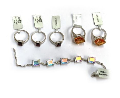 Two mystic orange quartz rings; together with a silver and mystic topaz bracelet; and three Malawi garnet and white topaz sil
