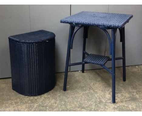 A dark blue Lloyd Loom laundry basket and Lloyd Loom occasional table, 54x53x71cmH
