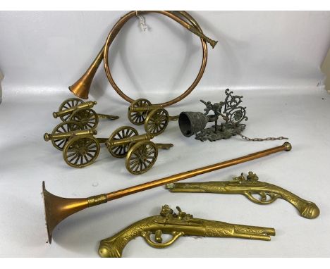 Collection of brass and copper items to include desk cannons and hunting horns 