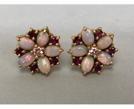 9ct Yellow Gold flower cluster earrings set with opal and ruby petals and a central Diamond approx 10mm in diameter 