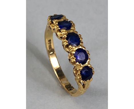 18ct Gold ring set with five Blue Sapphire Gemstones size approx 'K'