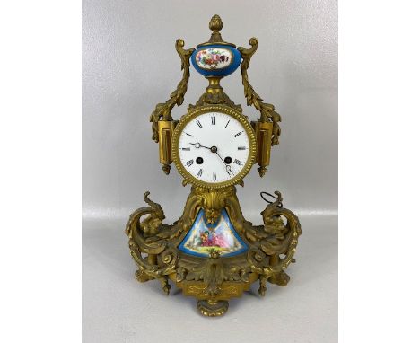 Antique clock, French 8 day mantel clock of gilt metal with inset porcelain plaques twin train movement approximately 37cm hi