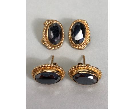 Two pairs of vintage 9ct Gold earrings with Oval rope design mounts, both pairs set with faceted Hematite stones. One pair be
