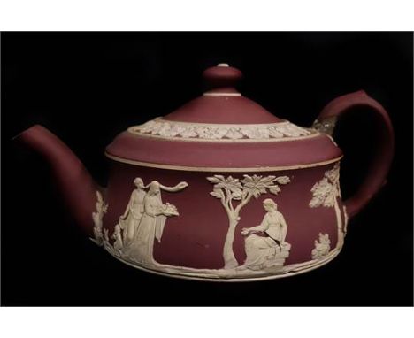 A rare Wedgwood crimson jasper teapot and cover, sprigged with classical figures, impressed Wedgwood England and numeral 5, 1