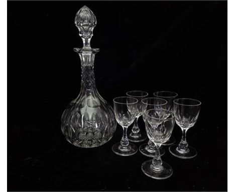 A good Victorian cut glass decanter and six port glasses, all cut with bands of ellipses (7)