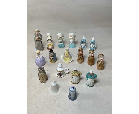 A quantity of Royal Worcester candle snuff figures to include Continental porcelain candle snuff figures